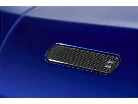 Aston Martin CD33-65-10108 DB11 Carbon Fibre Door Release | ML Performance UK Car Parts