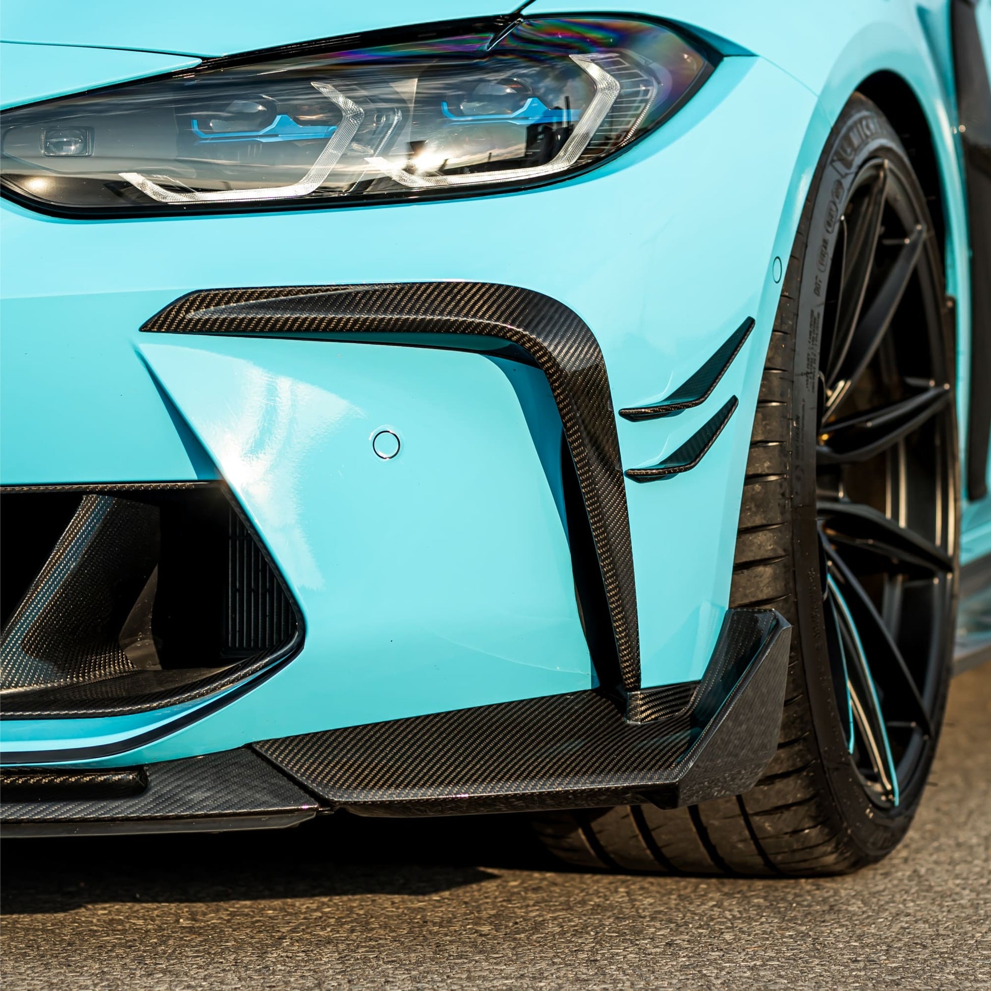 MANHART CARBON TWO-PIECE AIR INTAKE SURROUNDS FOR BMW G8X M3 / M4 (COMPETITION / CSL)